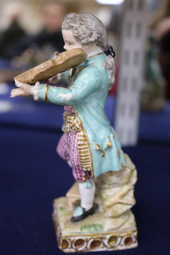 A Meissen figure of a boy violinist